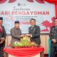 Pemotongan Tumpeng saat Ramah Tamah Peringatan HUT Kemenkumham dan Hari Pengayoman ke-79 di Luwuk